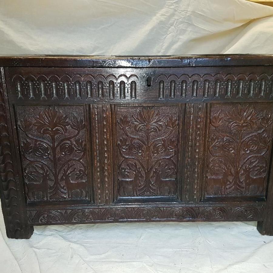 Seventeenth century carved oak three panelled coffer