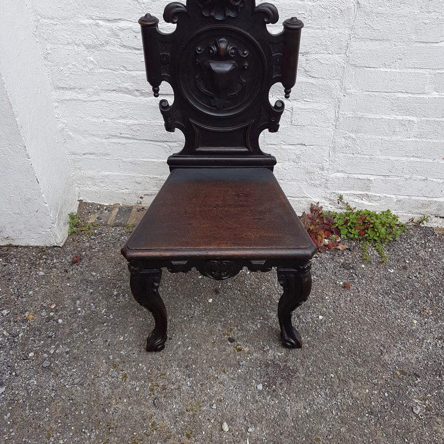Nineteenth century ebonised oak hall chair