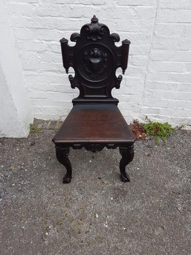 Nineteenth century ebonised oak hall chair