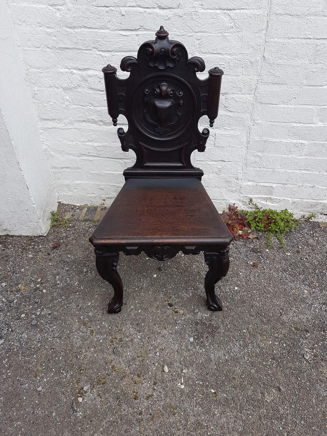 Nineteenth century ebonised oak hall chair