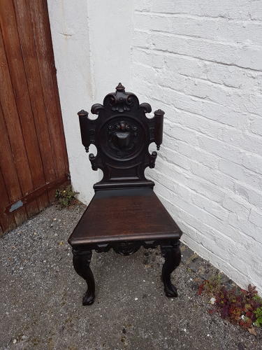 Nineteenth century ebonised oak hall chair